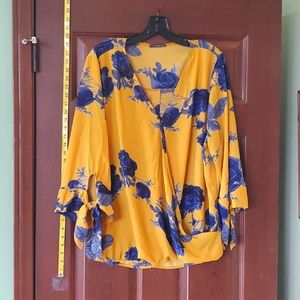 West Kei yellow & blue cross over blouse. Wide sleeve with open ties.